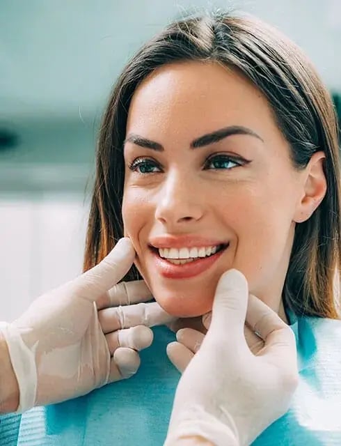 dental-exam-female-490x640