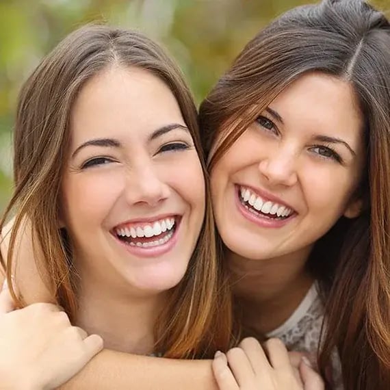 smiling-mom-and-daughter-570x570