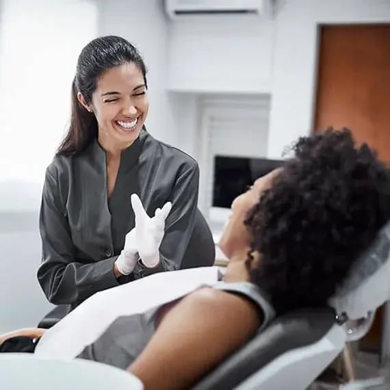 dental-exam-with-female-570x570
