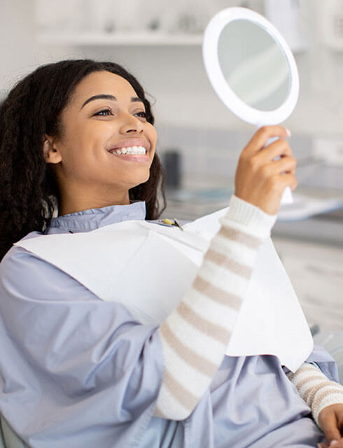 young-woman-checking-her-smile